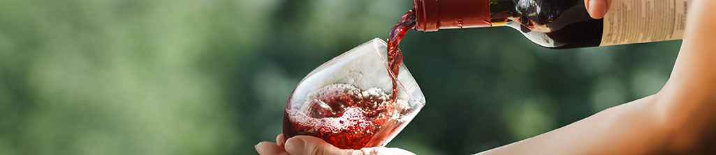 Women pours wine