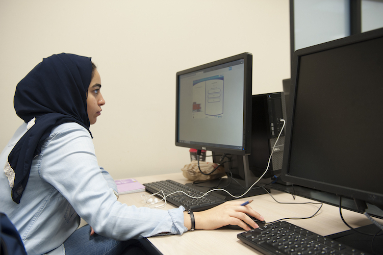 Student studying on a computer
