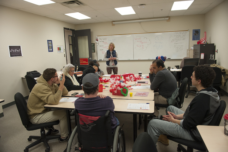 Diverse group of adult learners seated in a classroom
