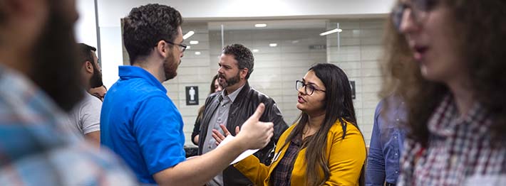 College students attending a networking event