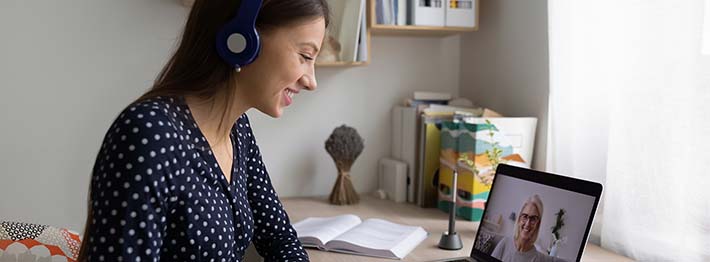 Woman in virtual job interview on a laptop