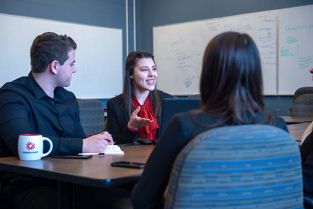 Business students working on a project