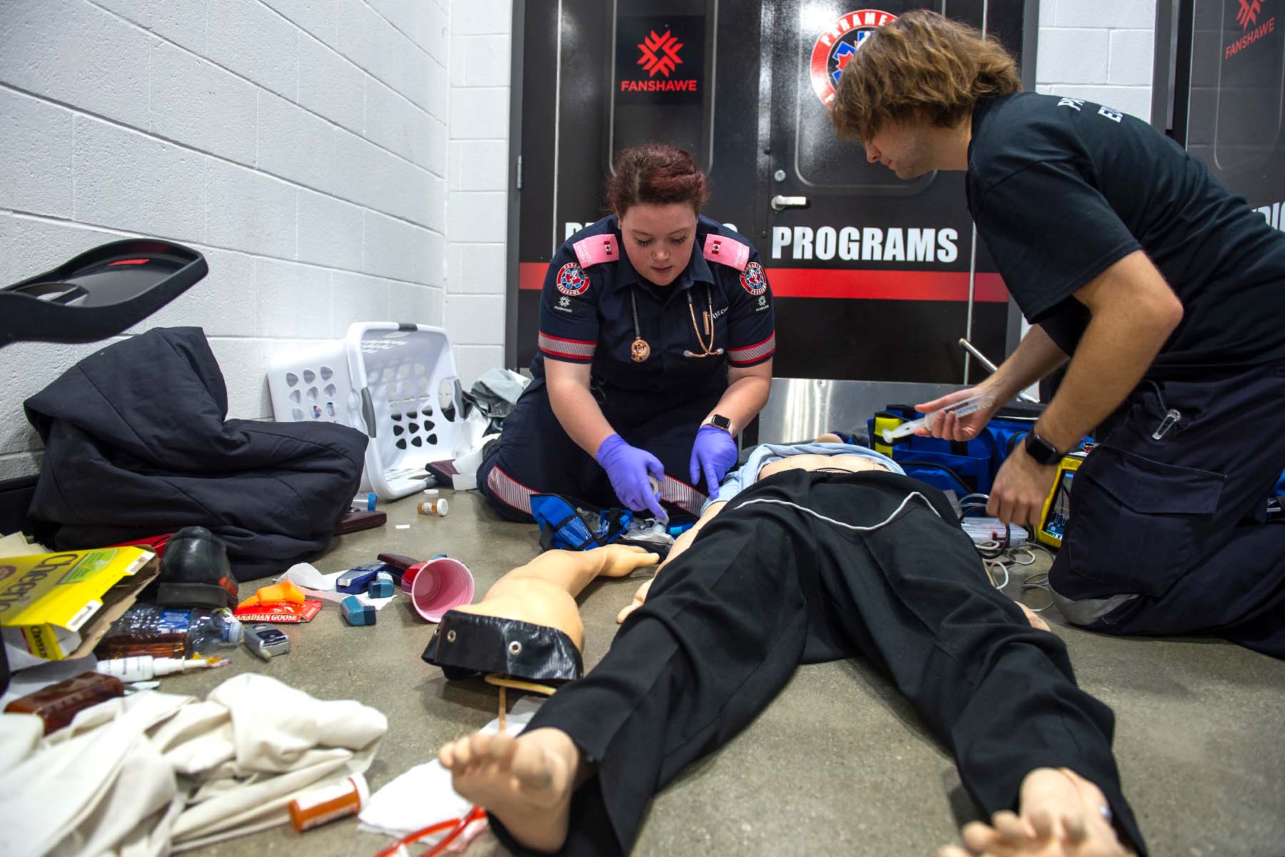 Paramedic student providing service under instruction