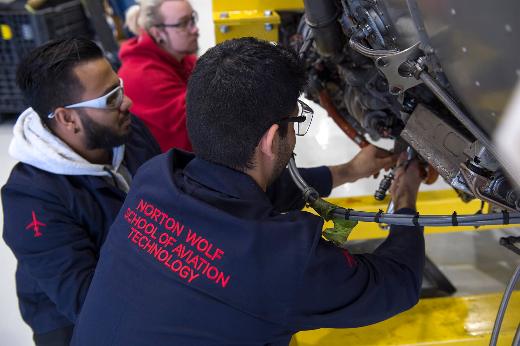 aviation technicians working on an airplane