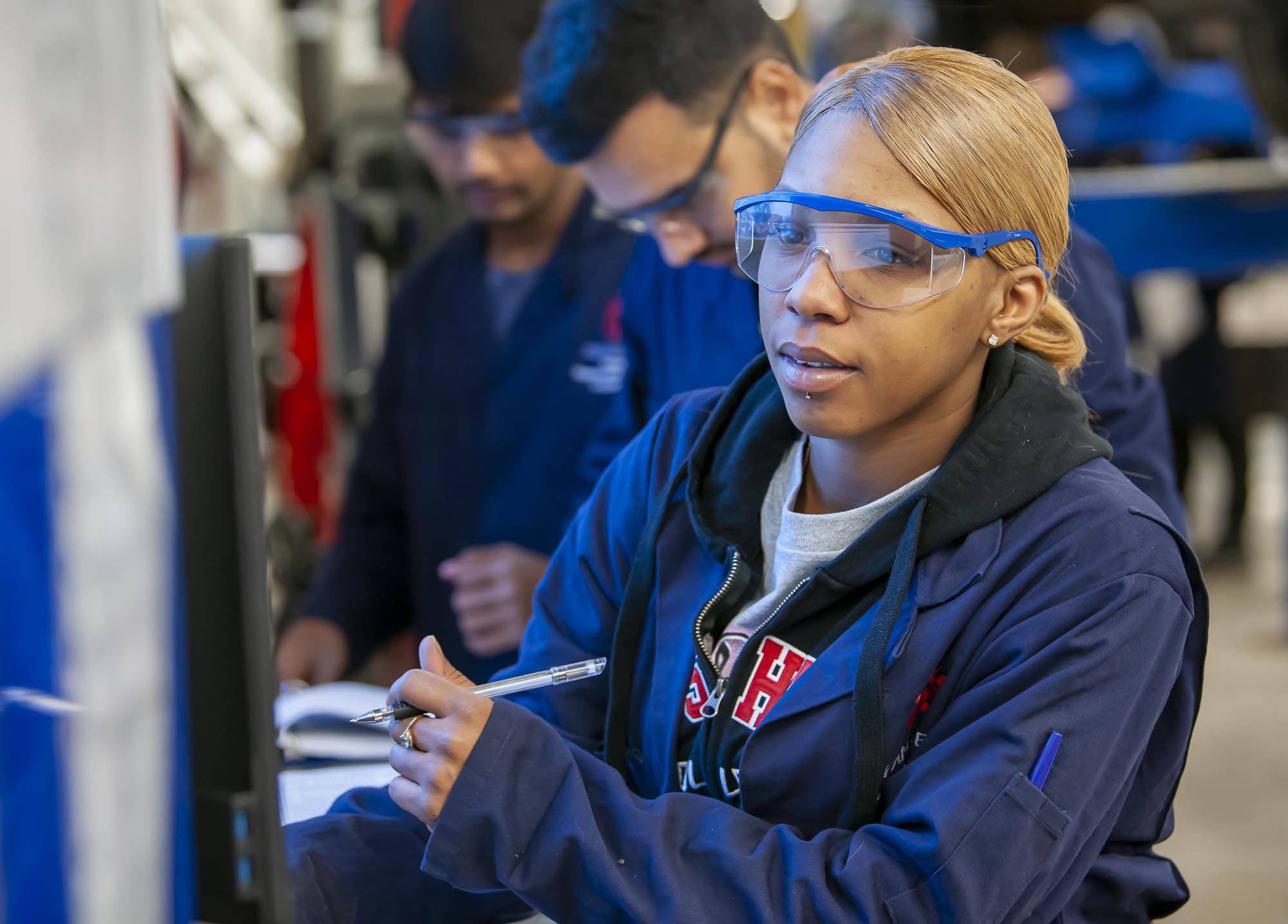 Motive Power Technician - Automotive student working in automotive lab