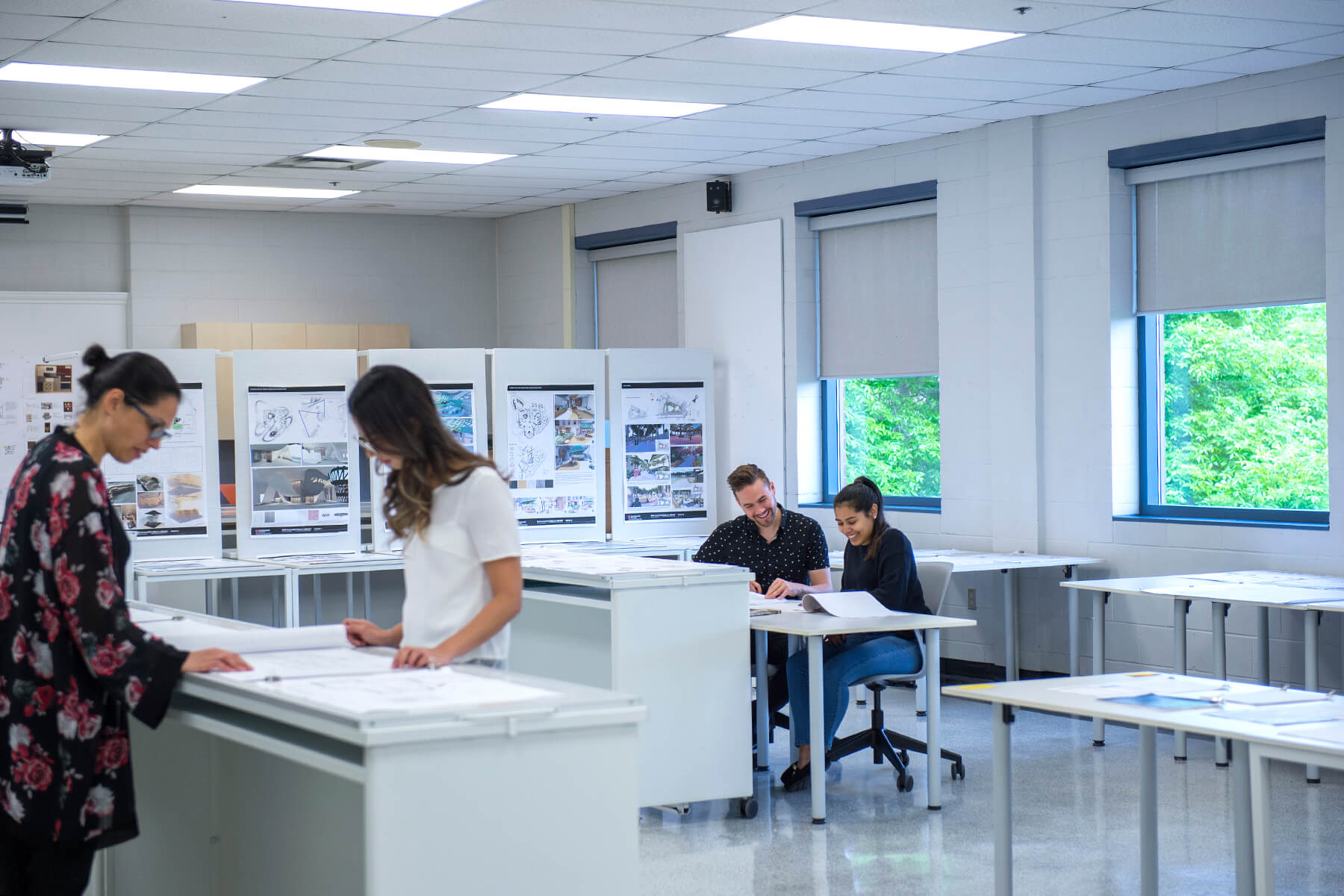 Interior design students working on a project