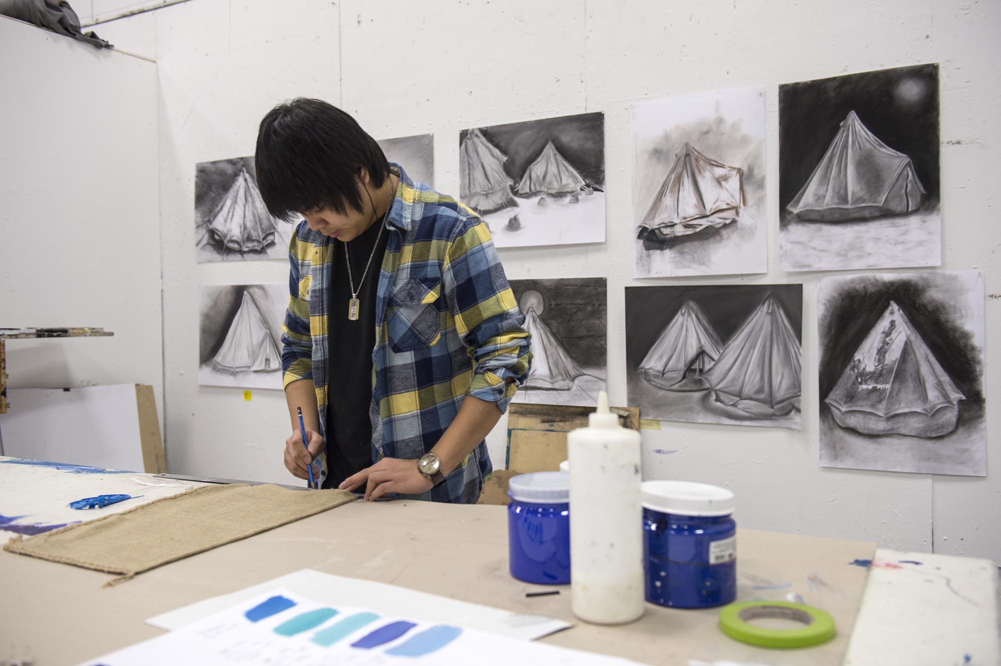 Fine art student, working in art studio
