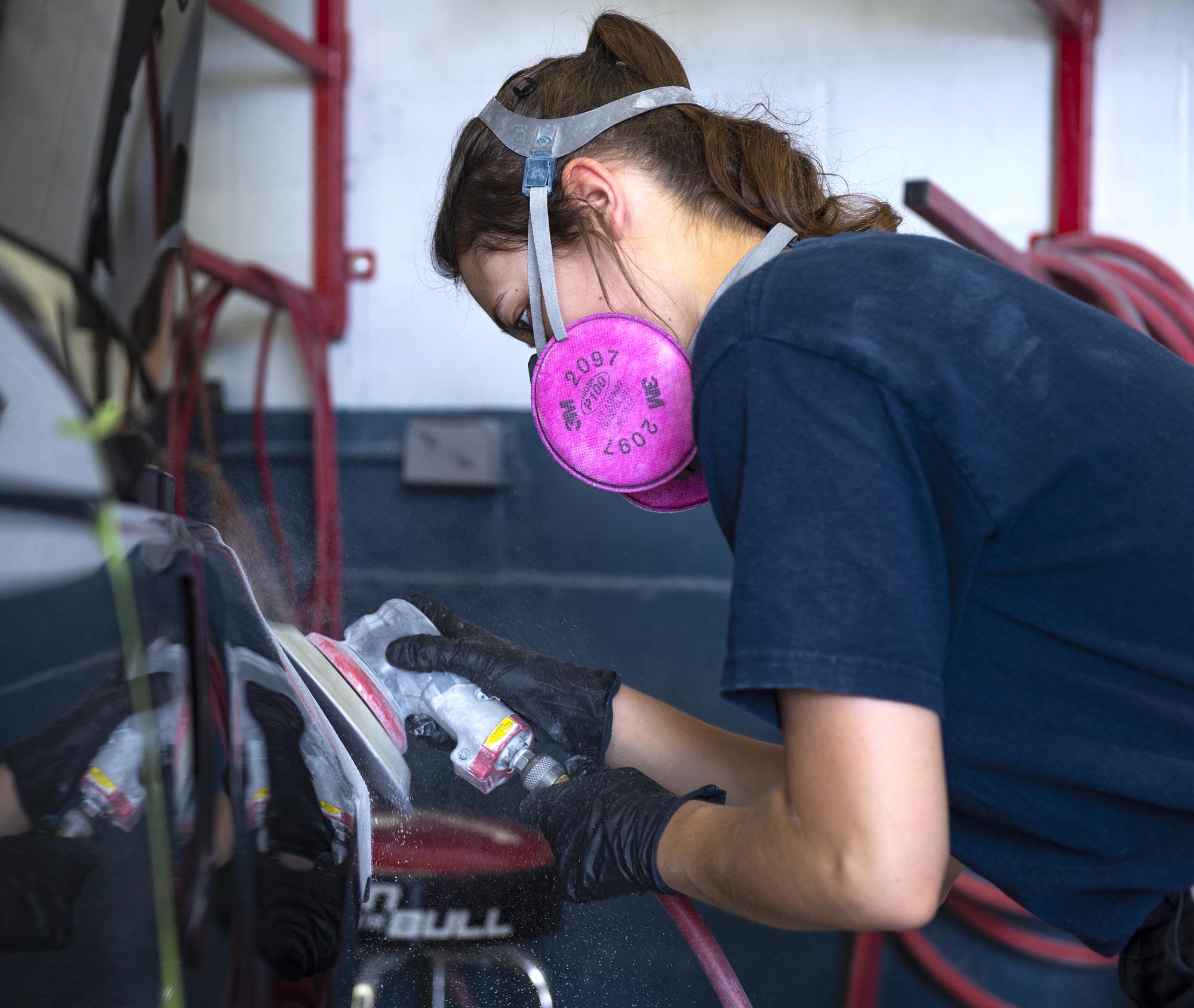 Fanshawe auto body student working on vehicle