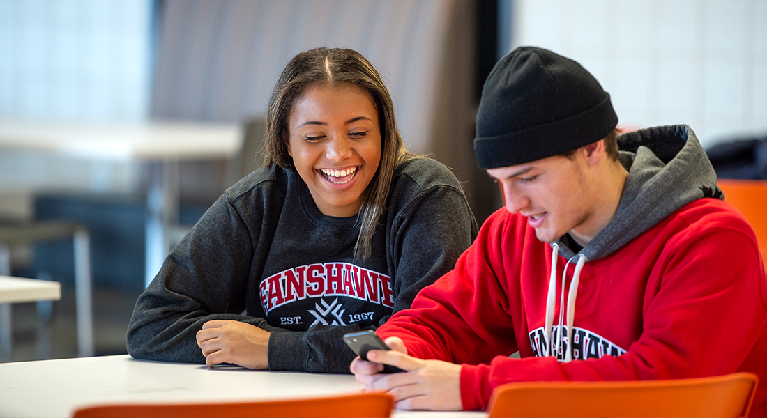 Two students at a table