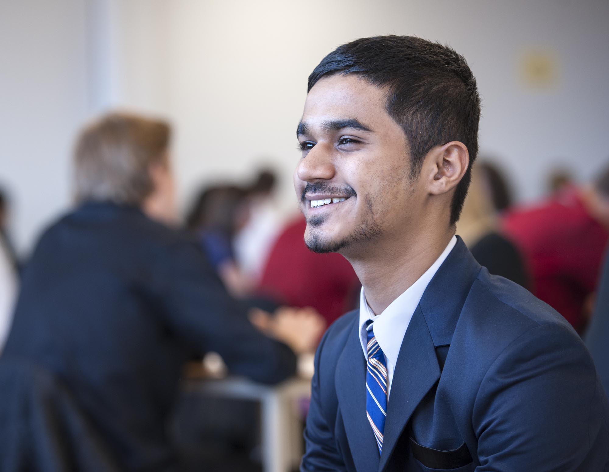 Fanshawe business student, smiling in classroom