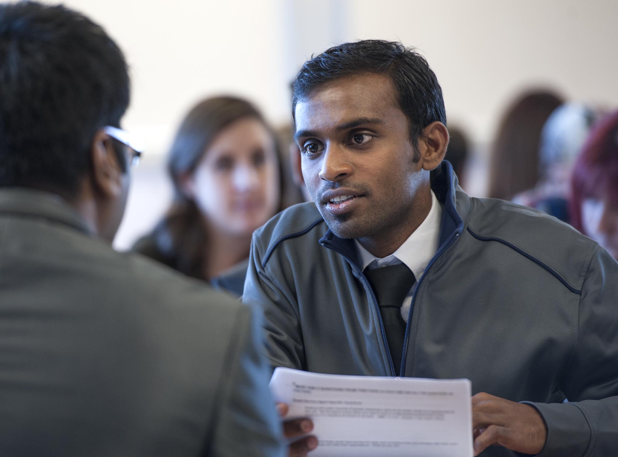 Fanshawe business student, in classroom setting, working with fellow classmates