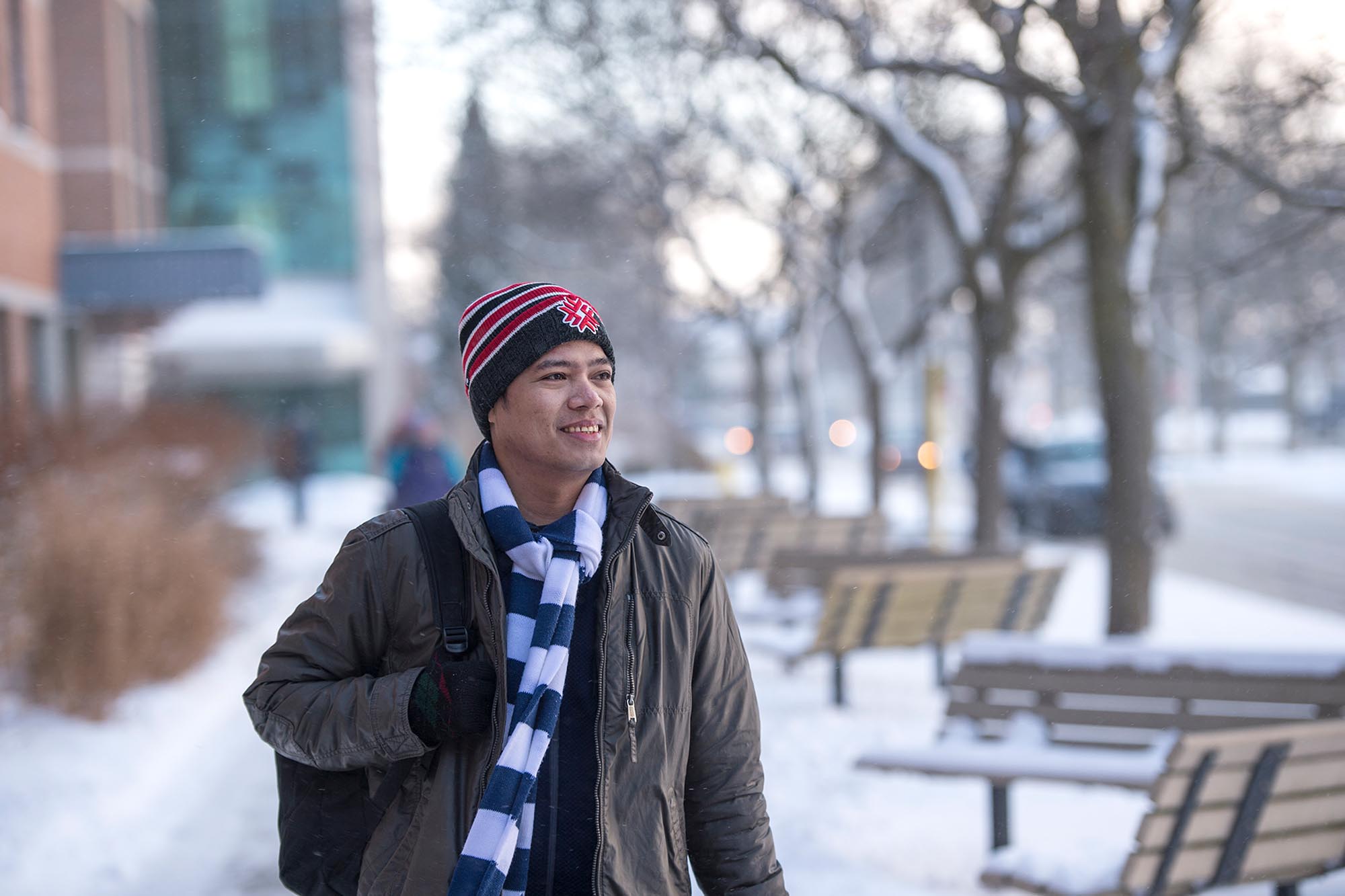 Student outside in winter