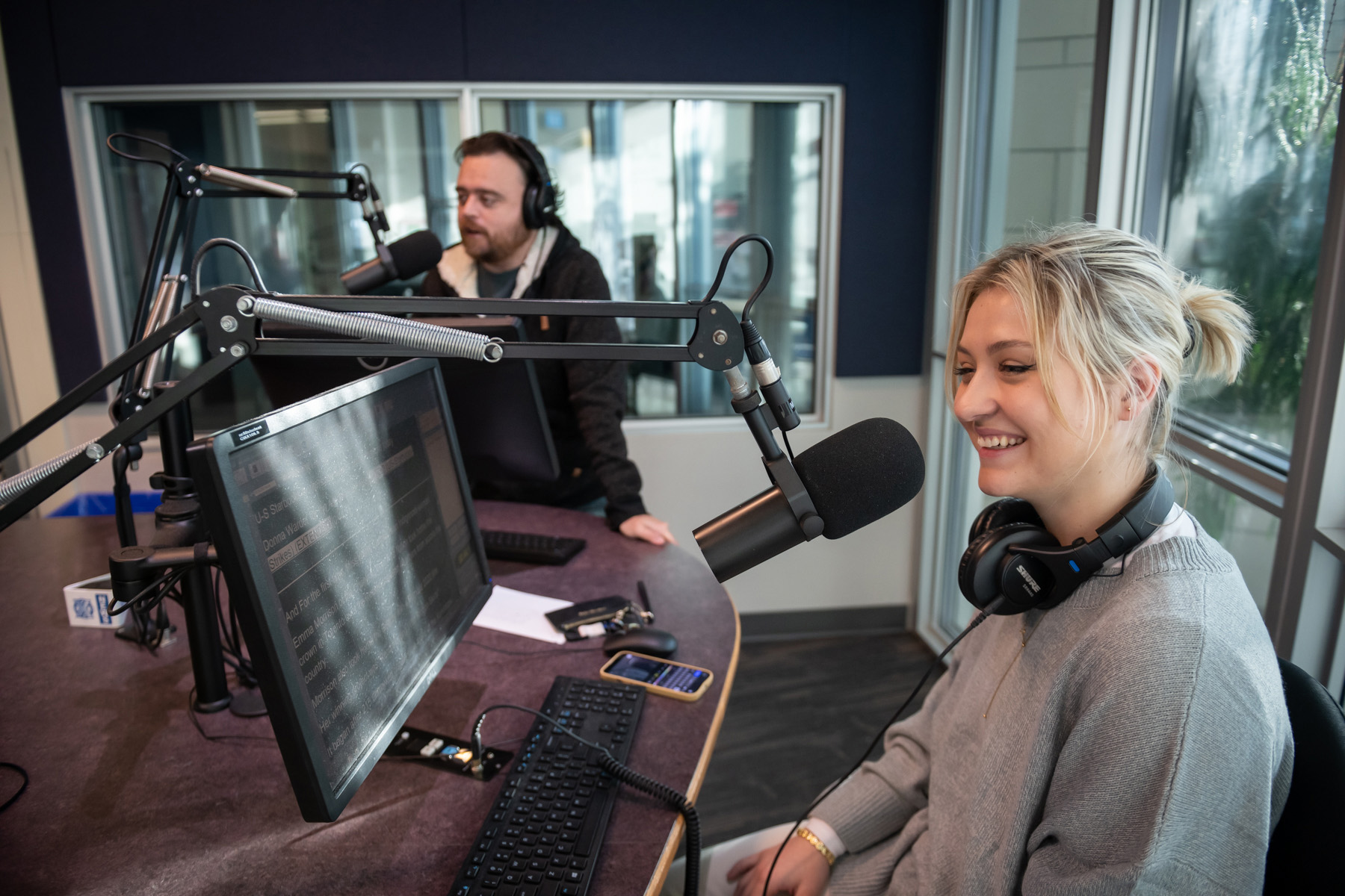 Student broadcasting from a radio station