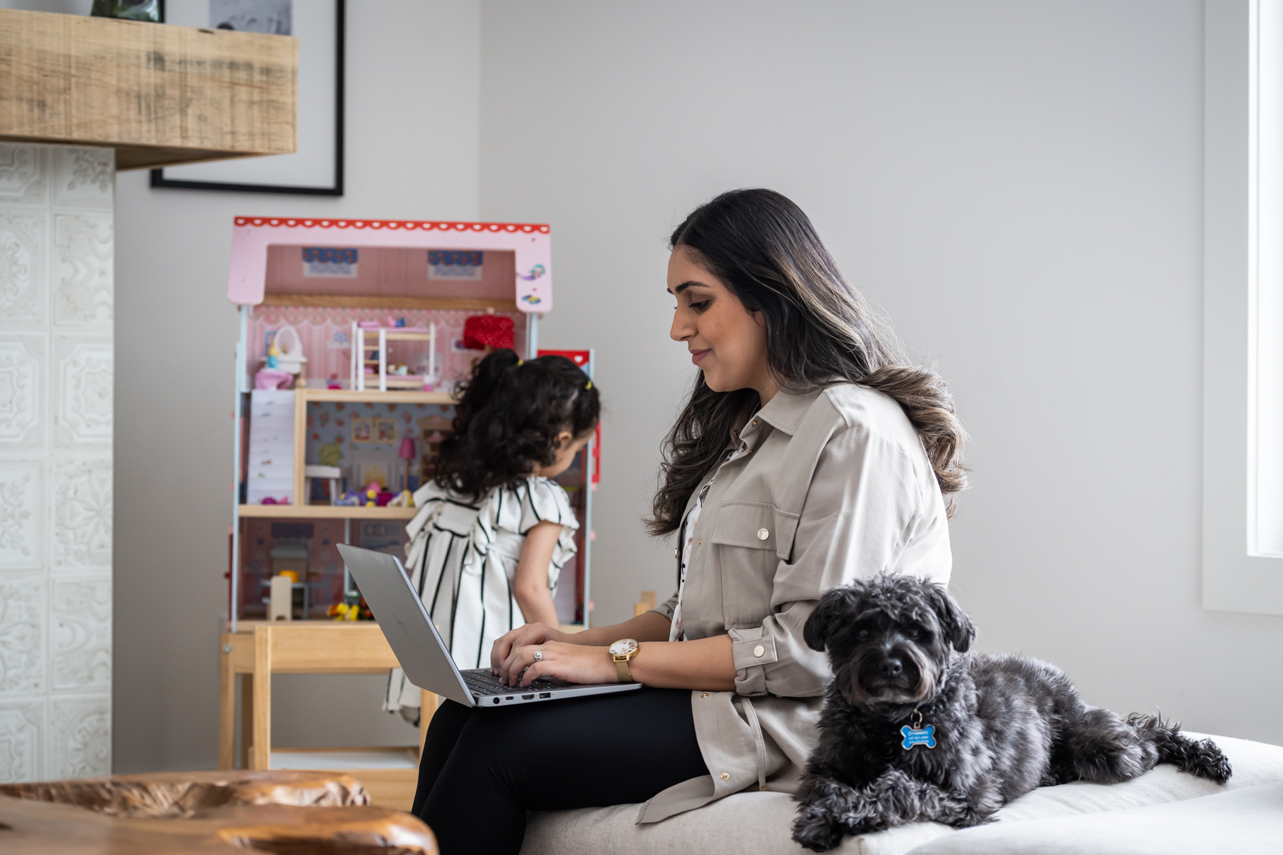 Photo of a student working in their living room