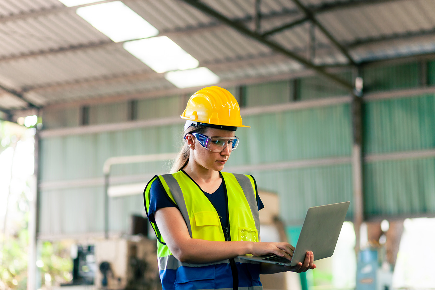 Photo of a safety inspector on their computer