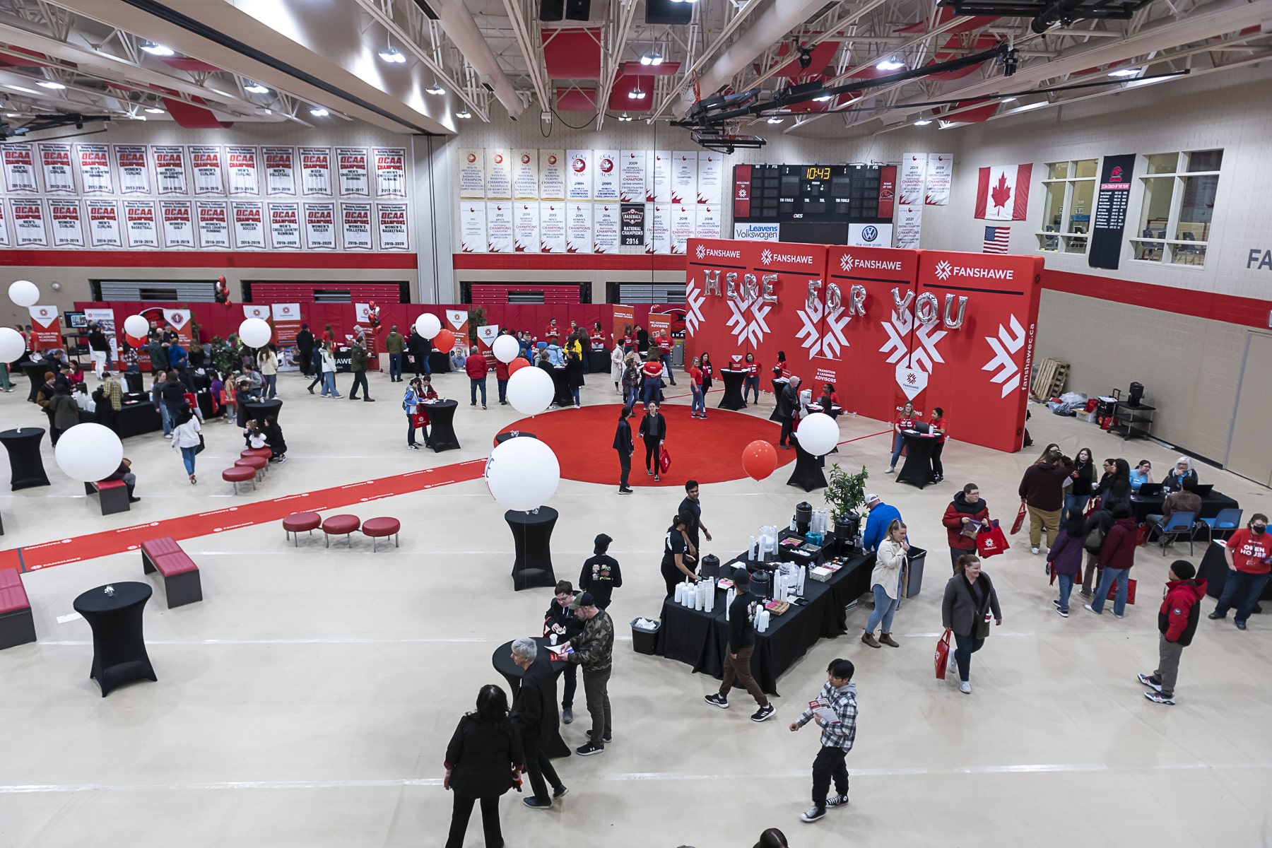 people exploring open house in the gym