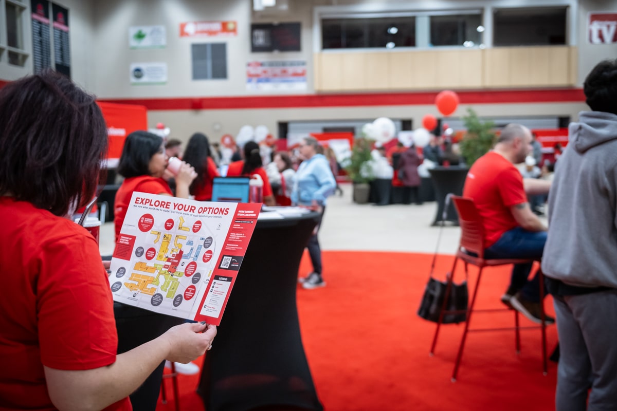 person looks at fanshawe map titled explore your options