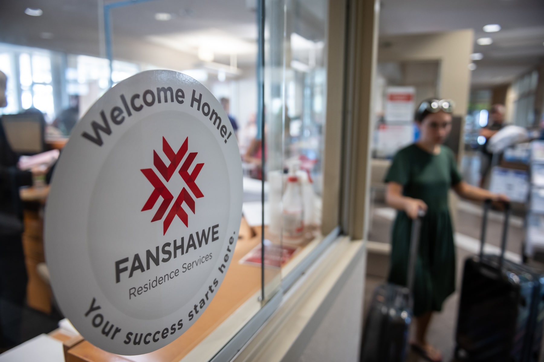 Welcome Home sticker on Fanshawe Residence window
