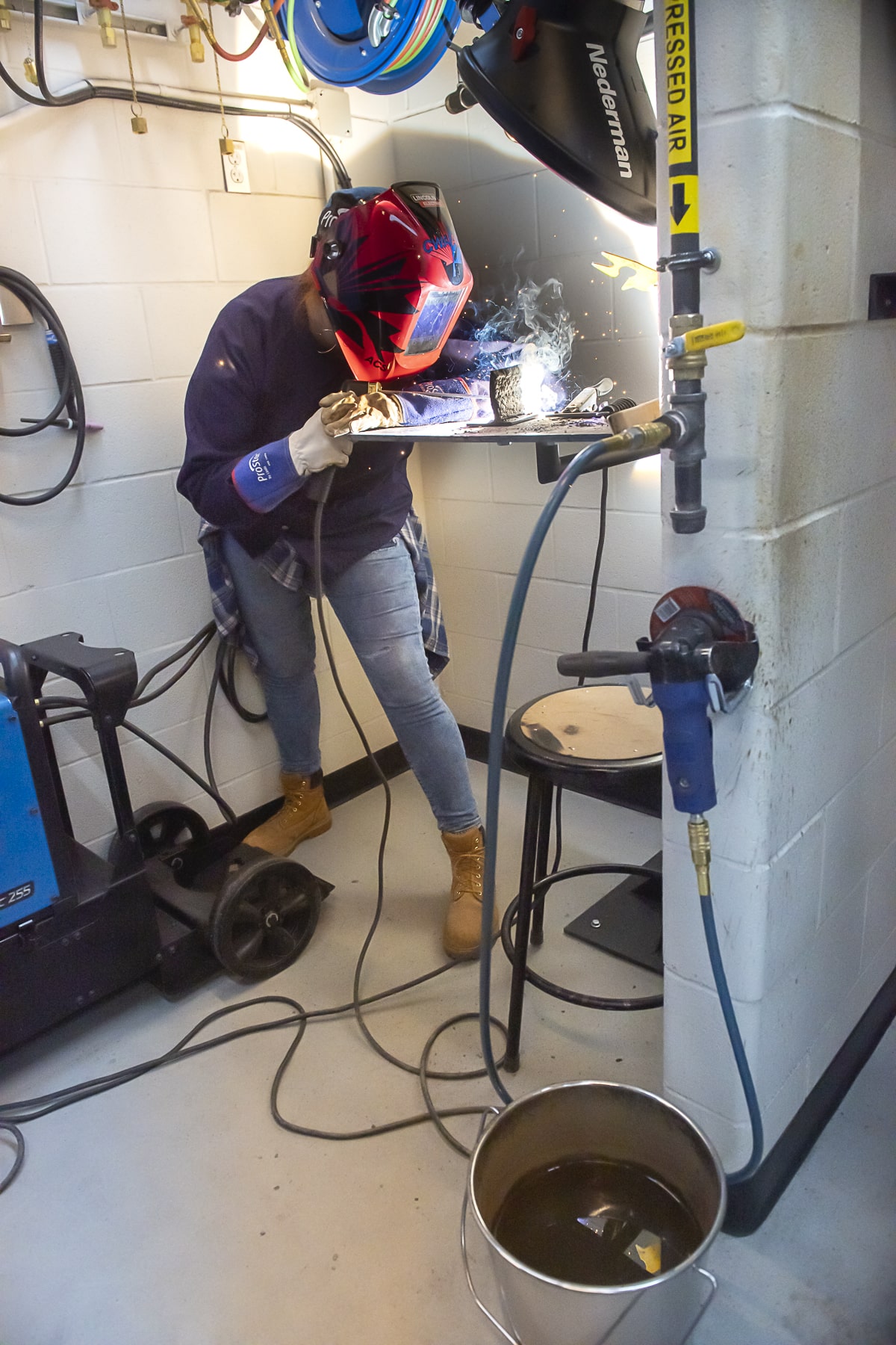 Gain Welding Experience student welding at work station