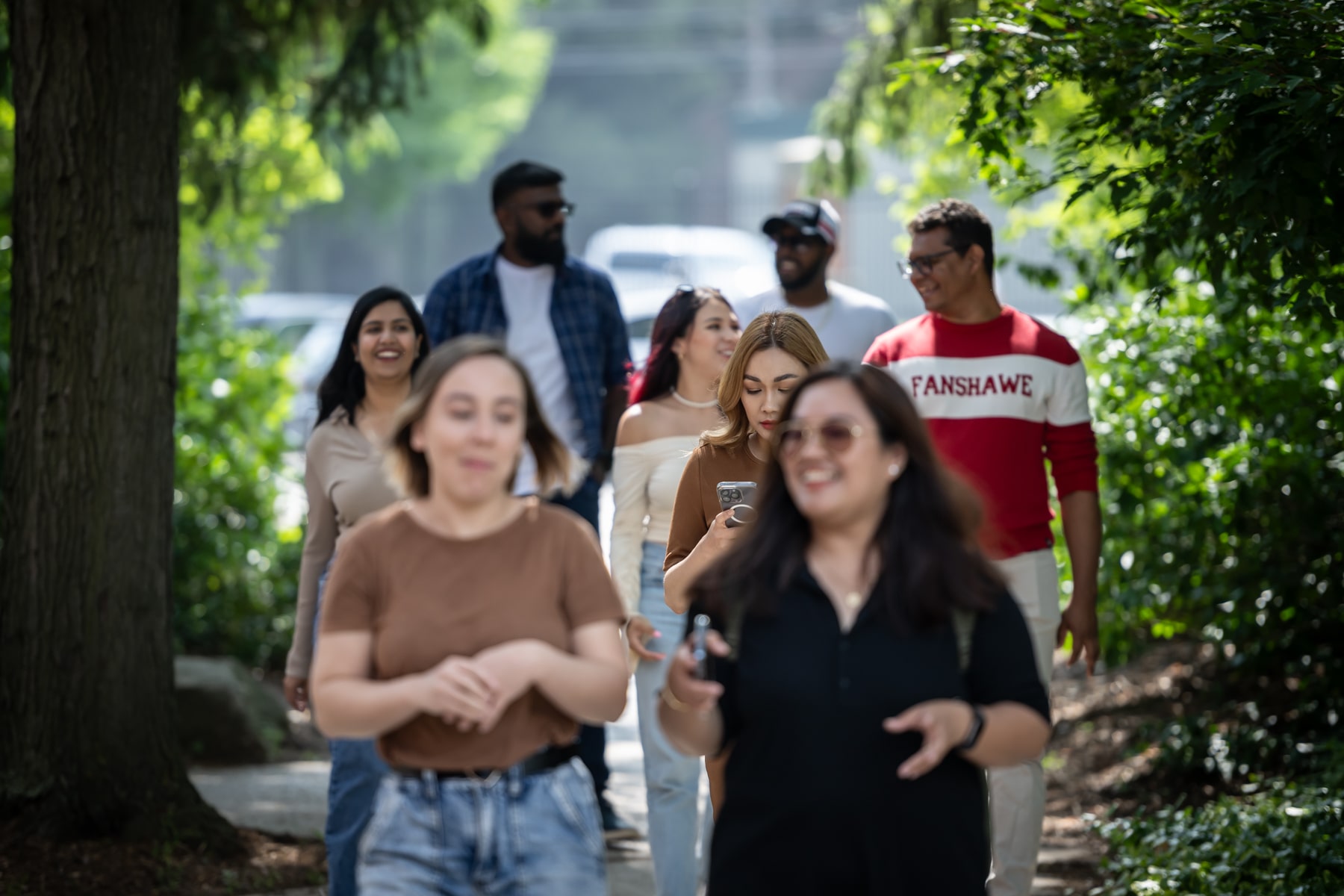 students walk outside at Fanshawe campus