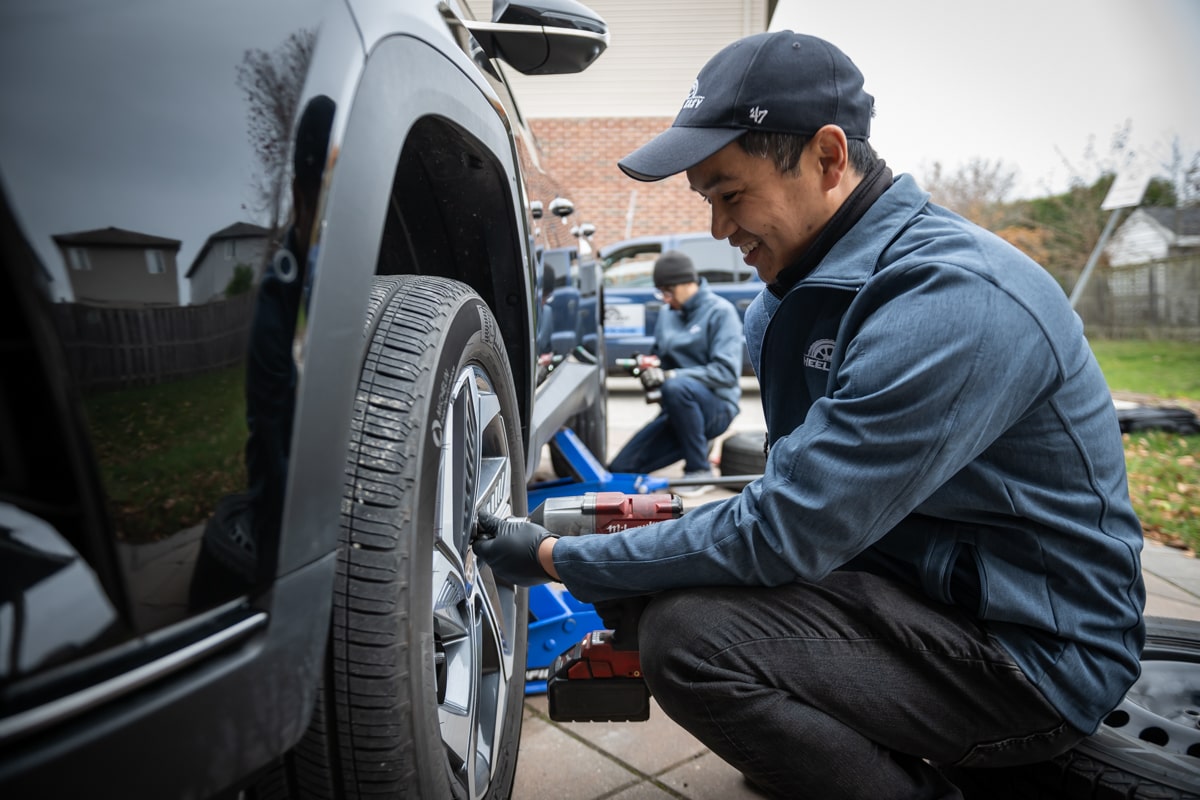 a man is changing a tire