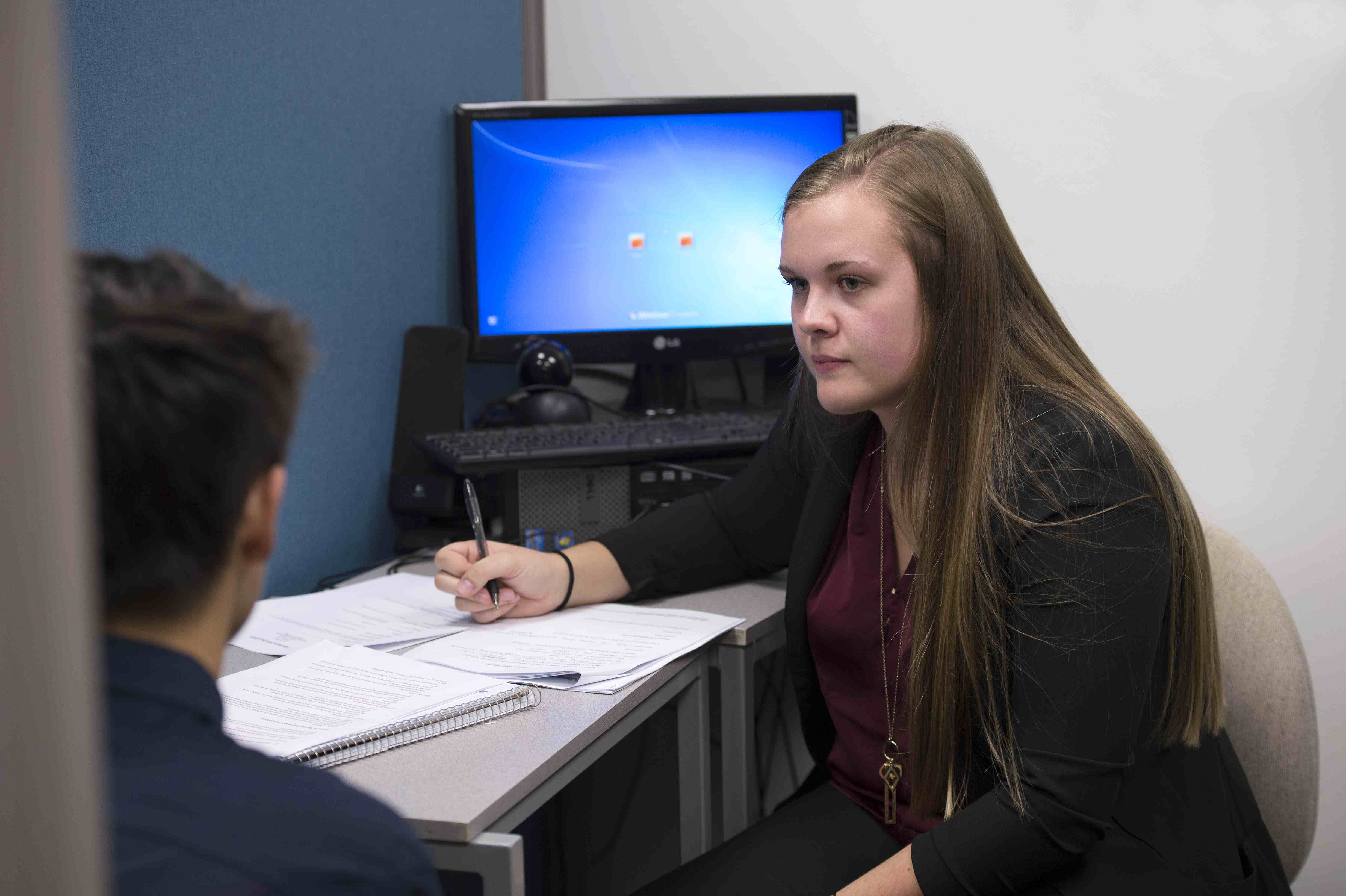 Career Practitioner interviewing a client