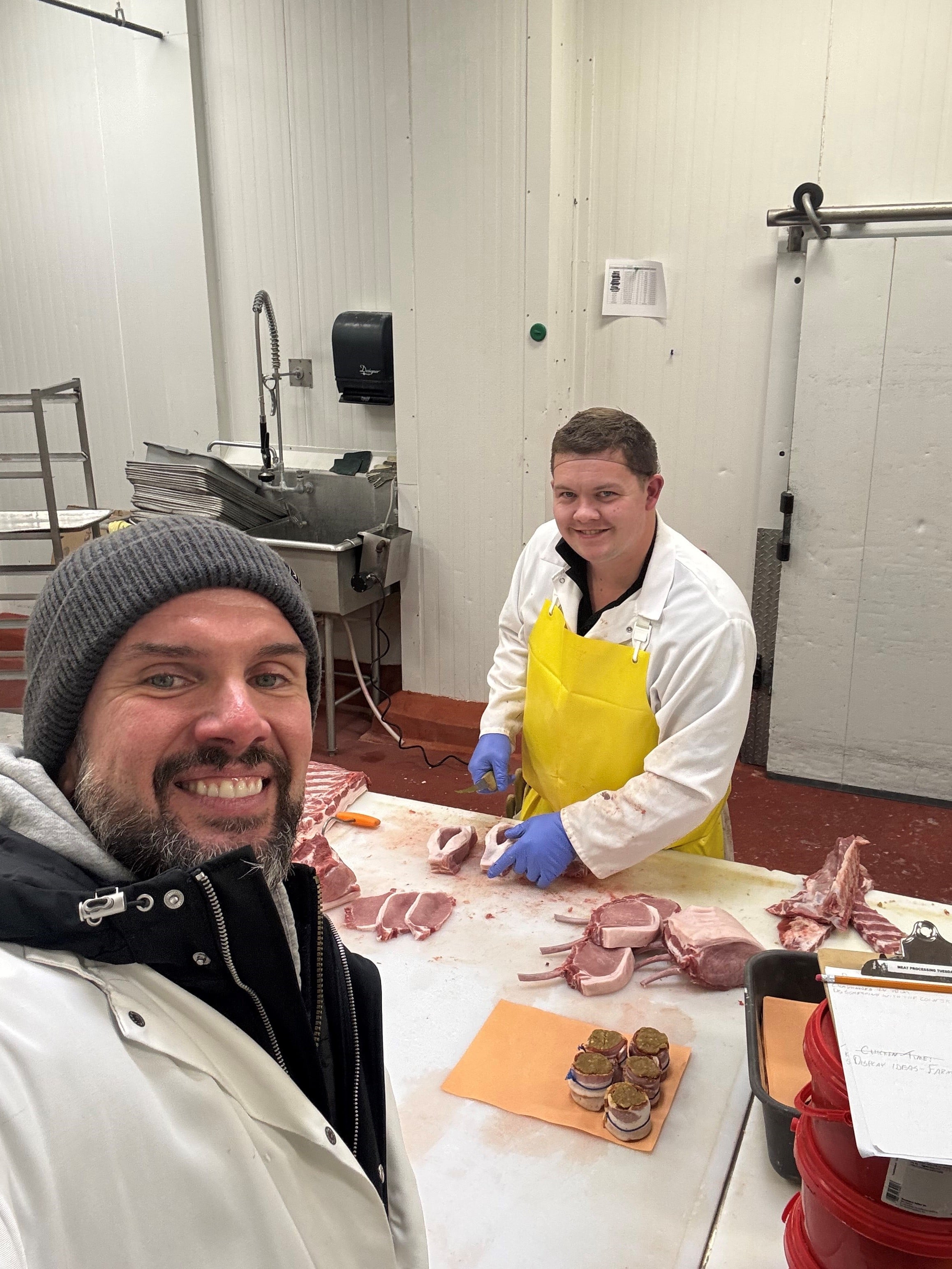 Troy Spicer and one of the Canadian junior butcher competitors, Dylan Miedema