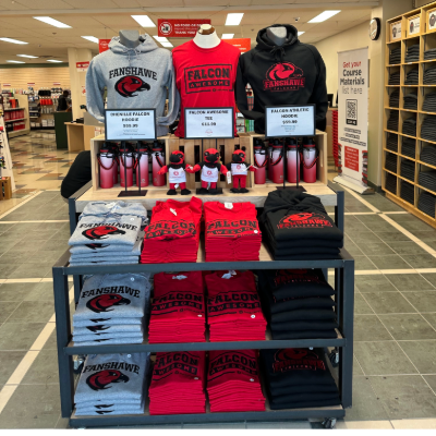 Display of Grey, Red and Black Hoodies and T-Shirts