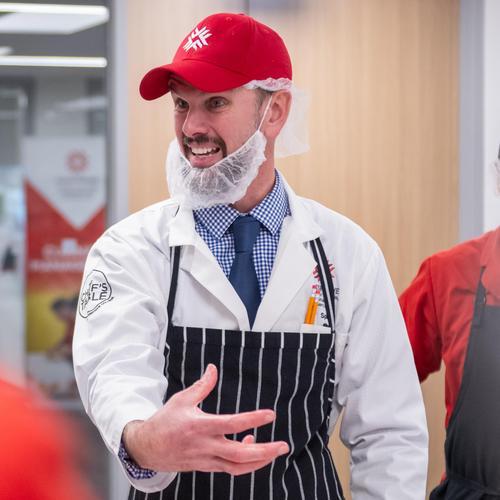 Photo of Troy Spicer lecturing to a class