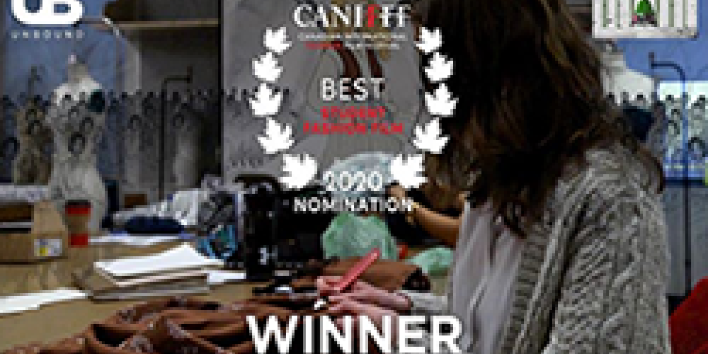 Female student sewing garment with film festival logo overtop