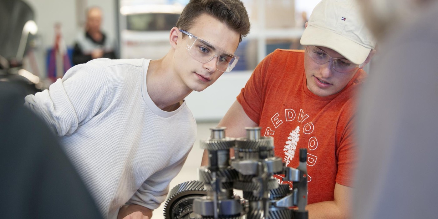 Automotive Service Technician students working in automotive lab