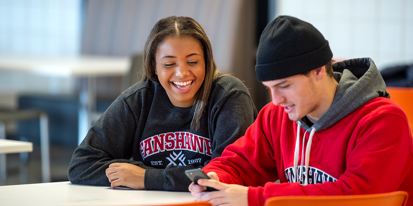 Two students at a table