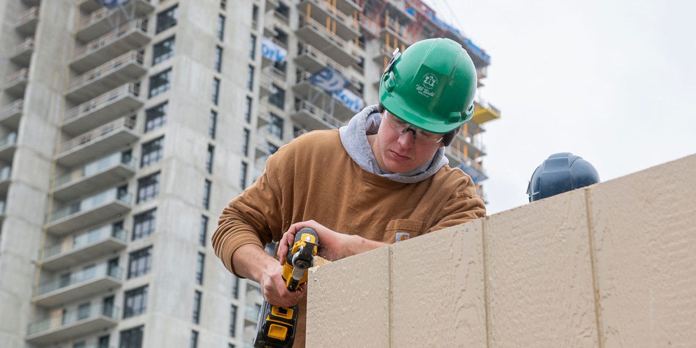 Construction student working at a job site