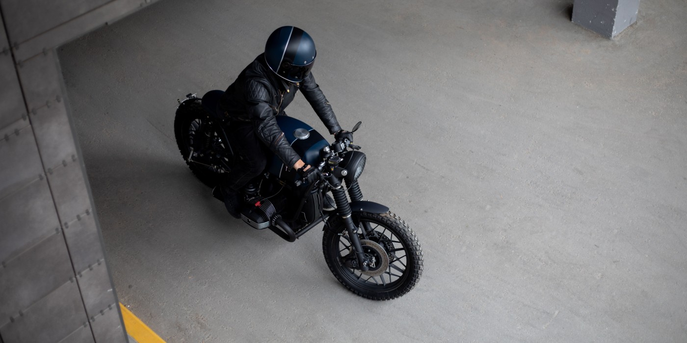 motorcycle driving through a parking garage