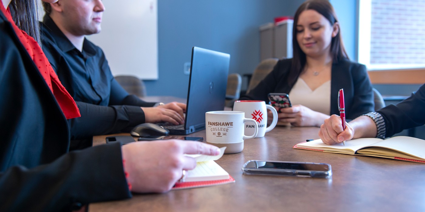 Fanshawe students working on a project