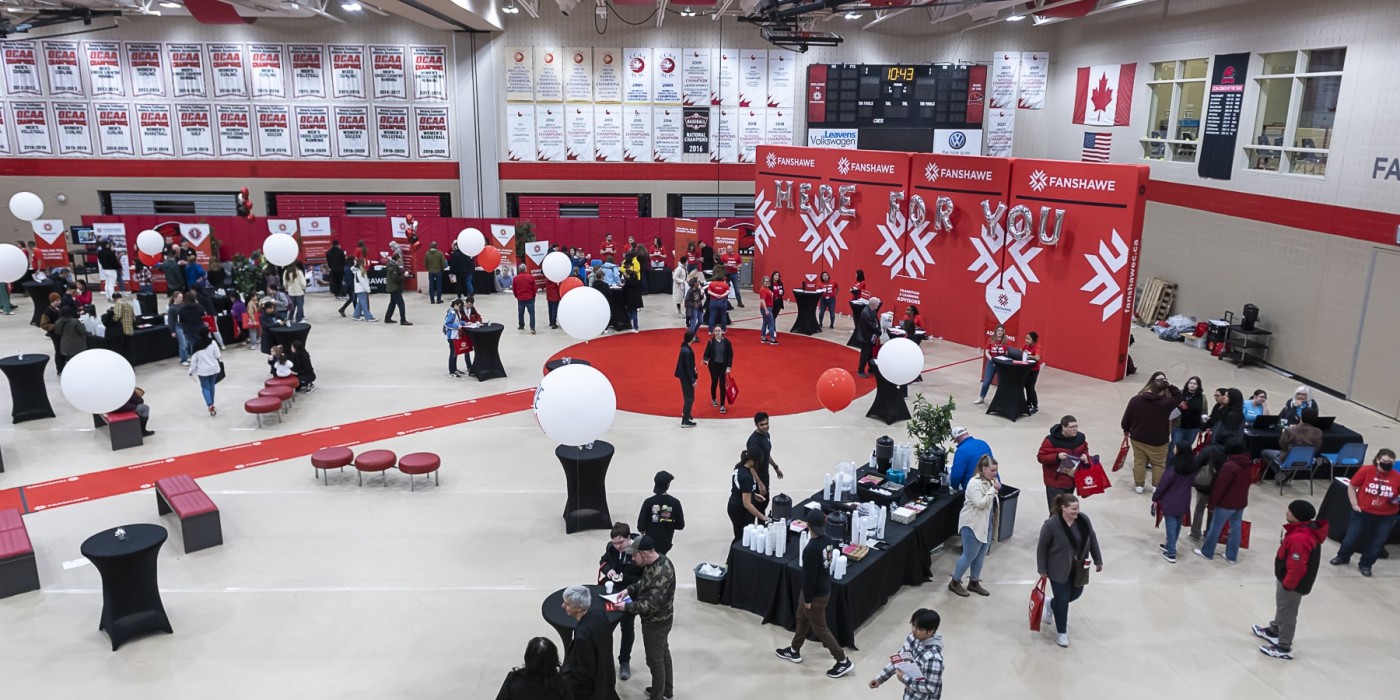 people exploring open house in the gym
