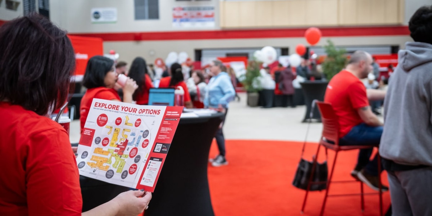 person looks at fanshawe map titled explore your options