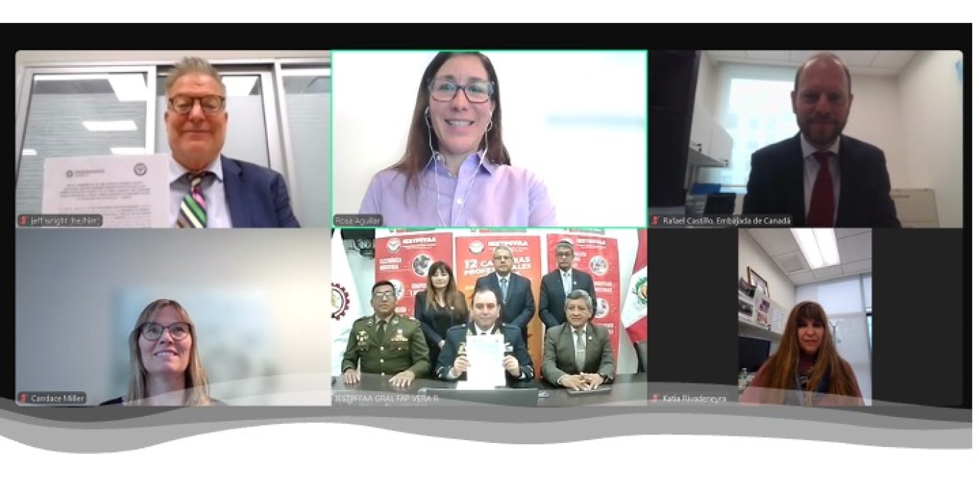 Group photo of officials signing Fanshawe Global Peru pact