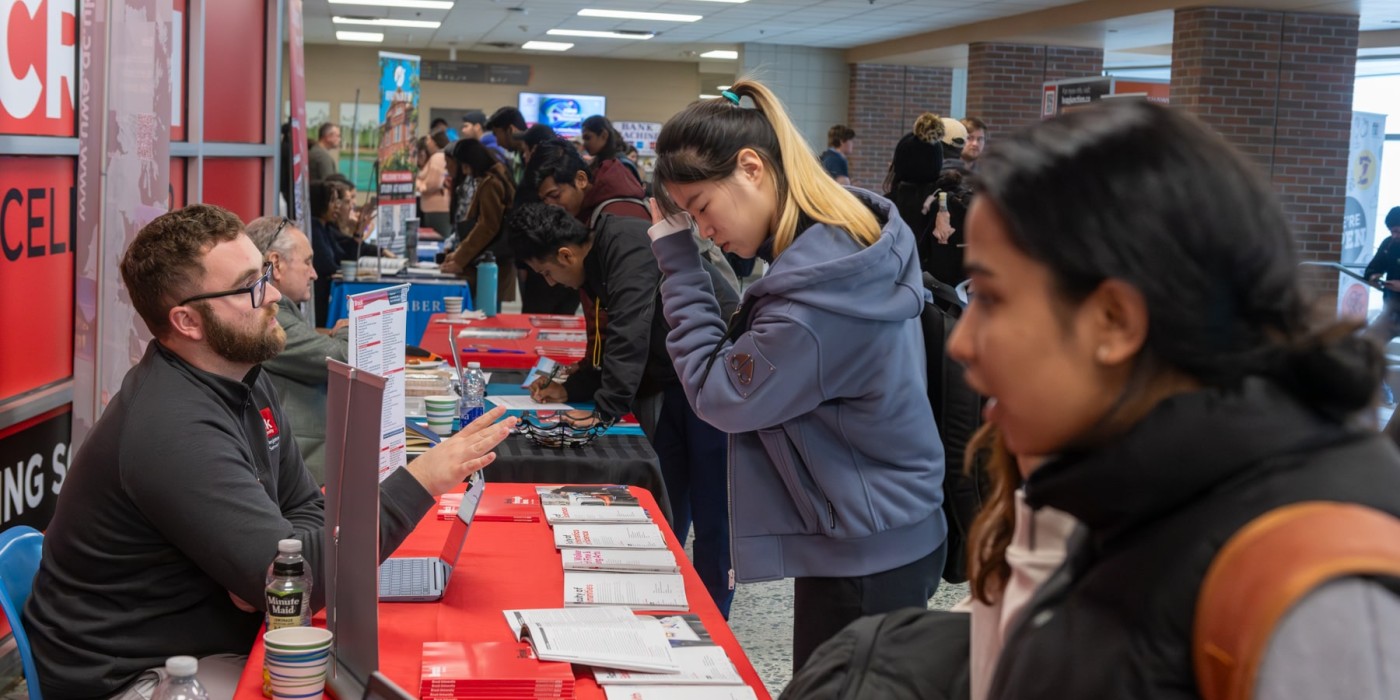 student considers educational pathway options at fanshawe's pathways fair