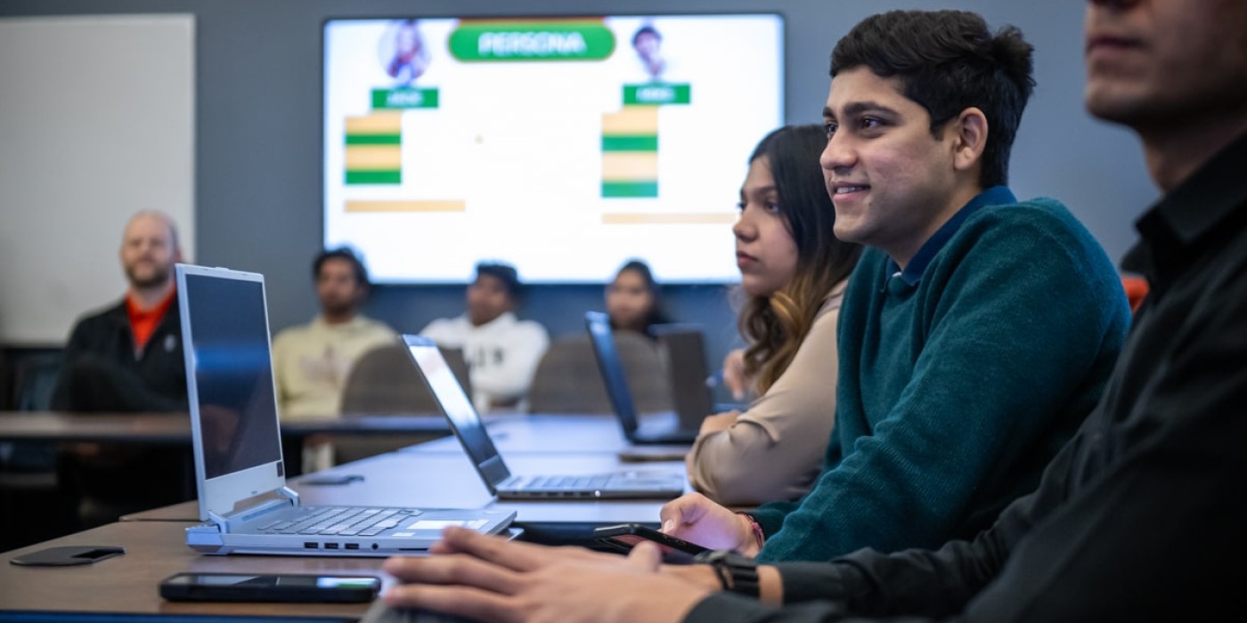 students in classroom watching presentation