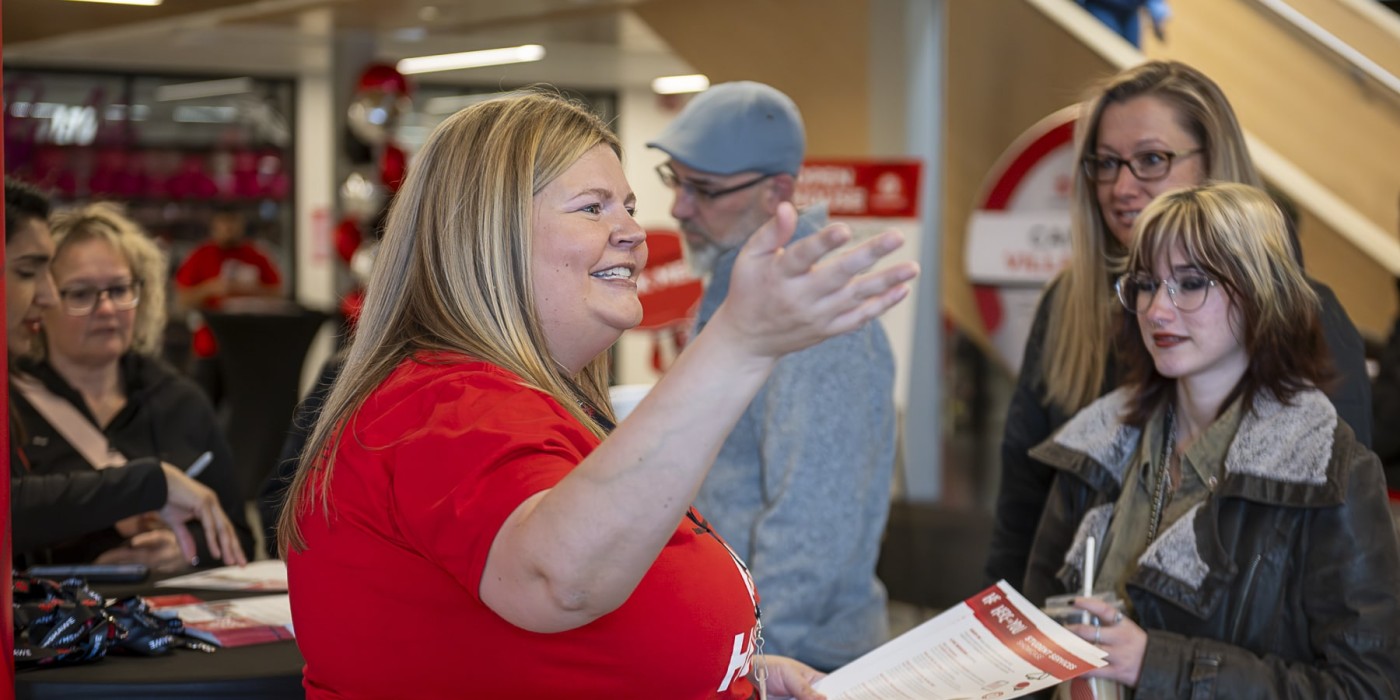 Fanshawe staff is giving an instruction to the new students at the Open House
