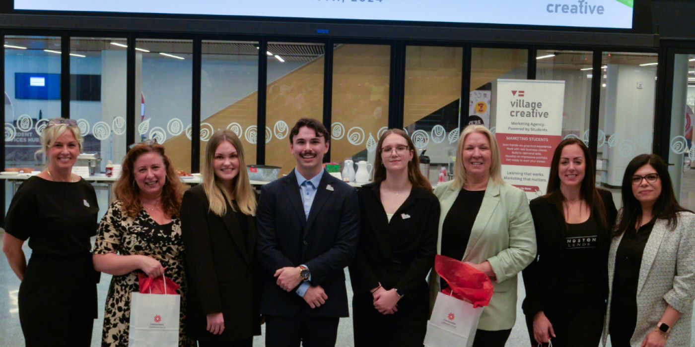 A group of students and professors at the Village Creative at Fanshawe College