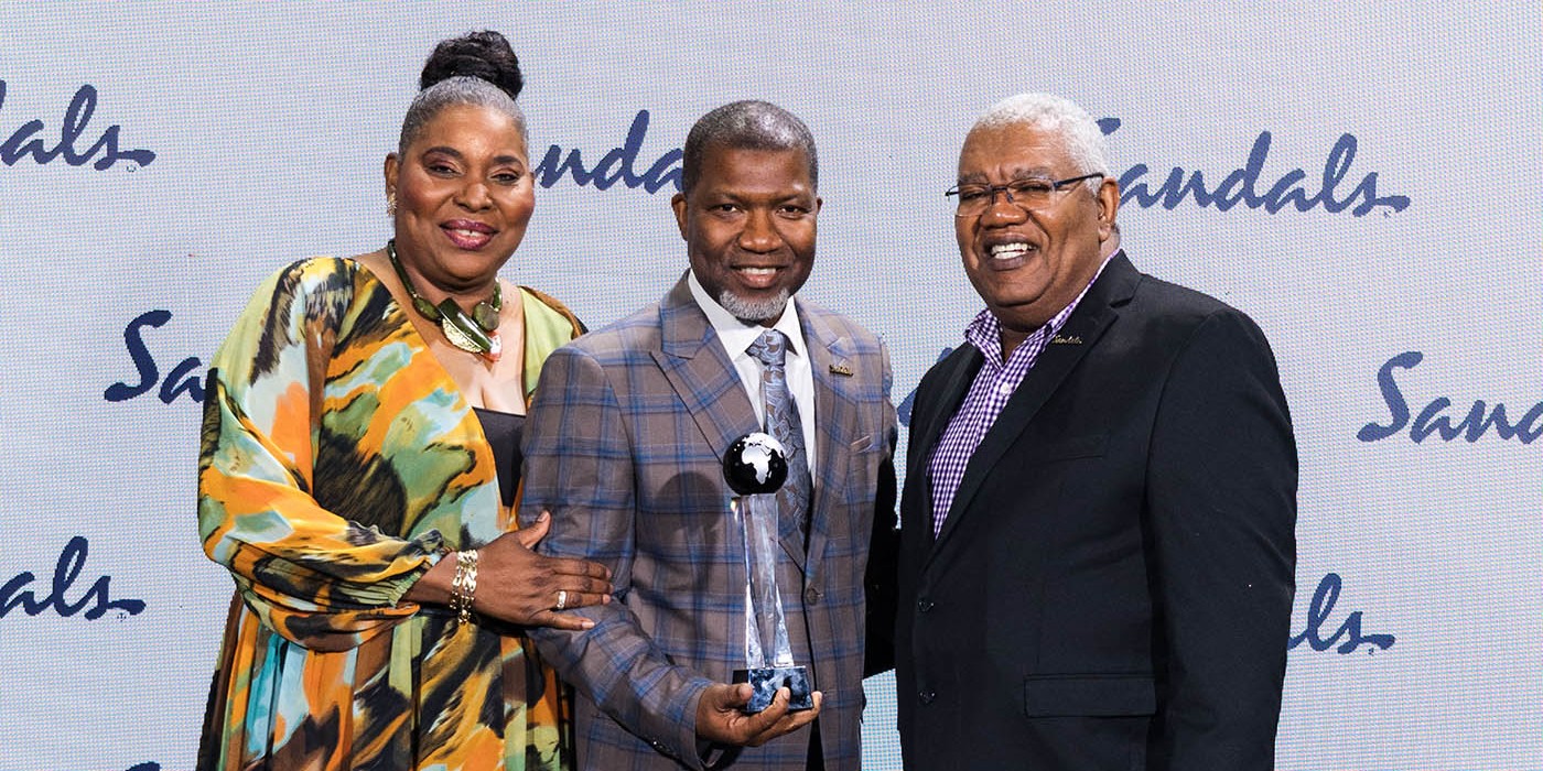 Maureen Barnes-Smith and Gary Sadler present Richard Todd with his award