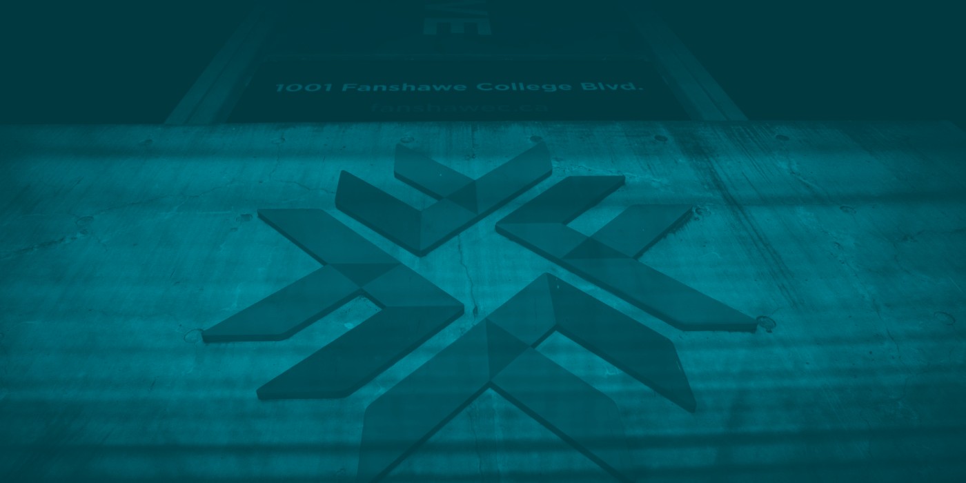 Fanshawe entrance lit teal