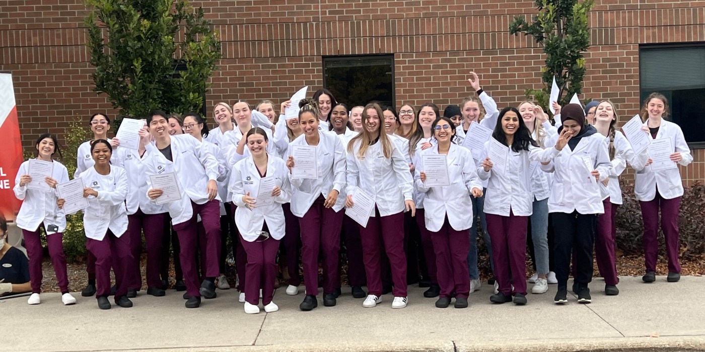 Dental Hygiene students cheer after pinning ceremony