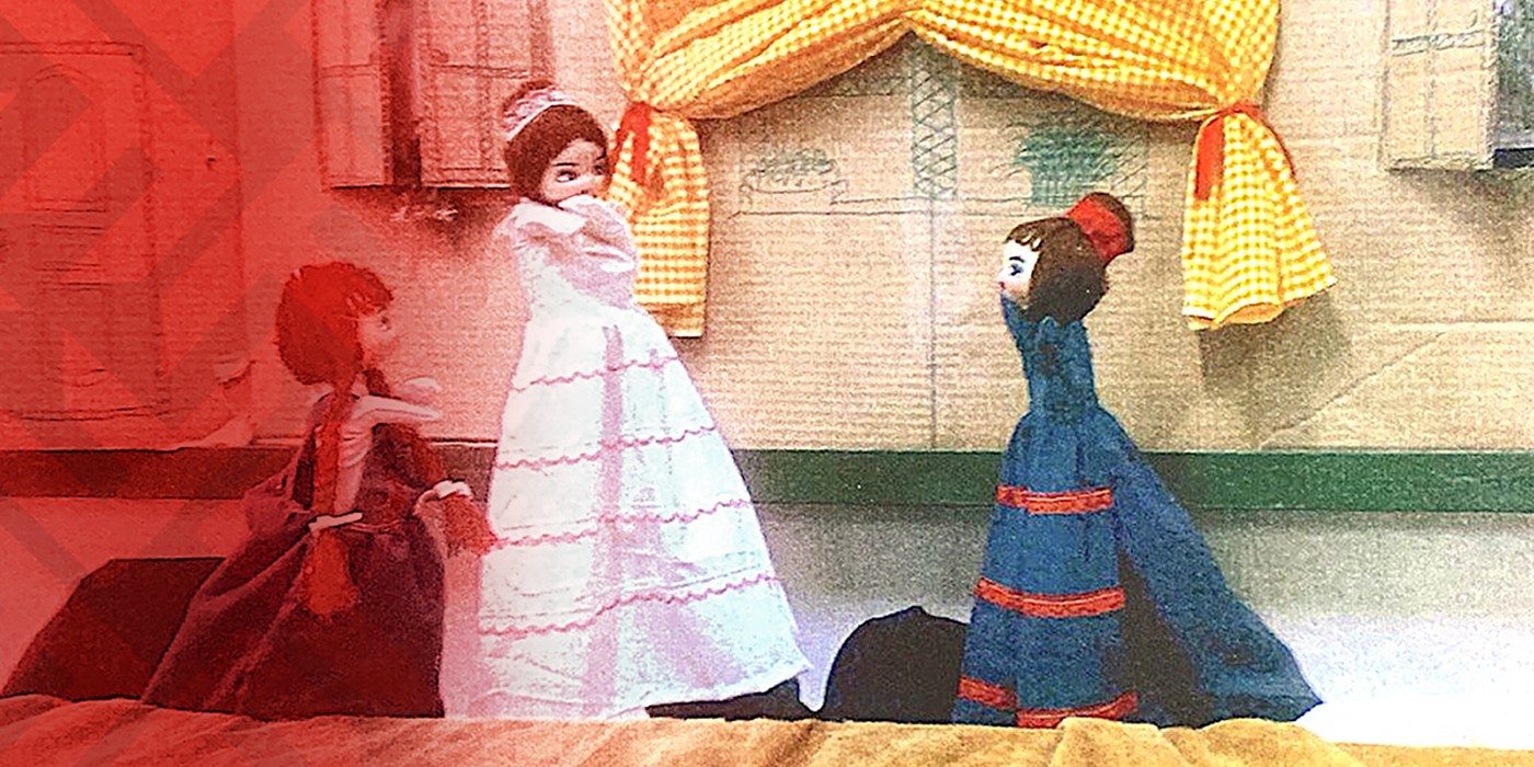 Closeup of fabric puppets in a doll house