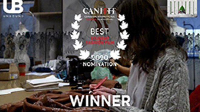 Female student sewing garment with film festival logo overtop