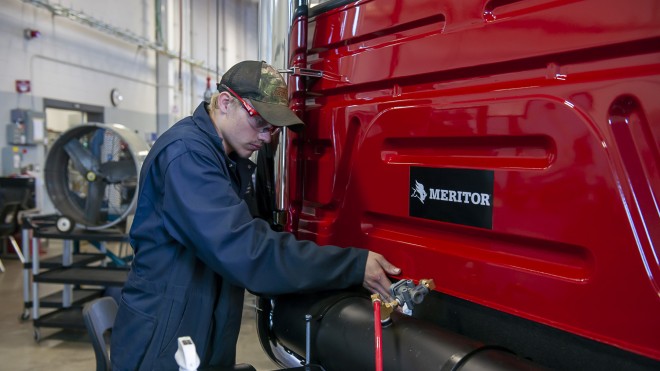 Student working on truck