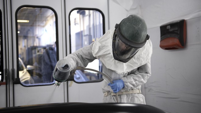 Auto Body Repairer Apprentice student working in auto body shop at Fanshawe College