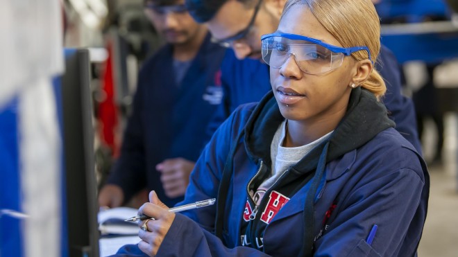 Motive Power Technician - Automotive student working in automotive lab